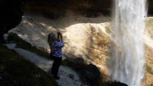 Walking behind the waterfall