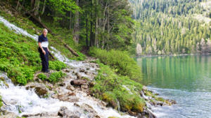 Tricky crossing flooded waterfalls, Black Lake, Montenegro