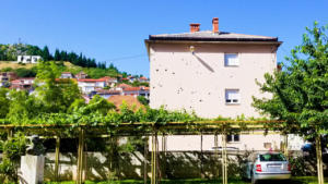 Bullet holes still seen in buildings in Bosnia
