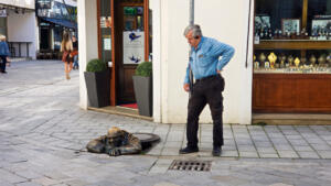 Mike talking with a friend in Bratislava "Man at Work"