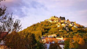 Driving by great tourist medieval town of Motovun, Croatia