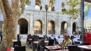 Mike outside France’s best-preserved Roman amphitheatre in Nîmes