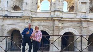 Having a drink in front of the Roman Amphitheatre in Arles, France
