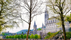 Lourdes Basilica with the Fort in the background