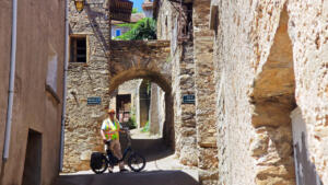Cycling through the village of Mons in the mountains in France.