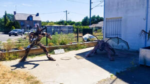 Weird metal statues near Dingé train station in France