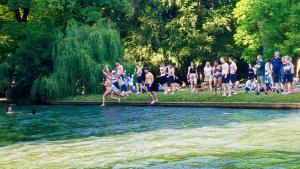 Having fun rapidly floating the River Isar in Munich