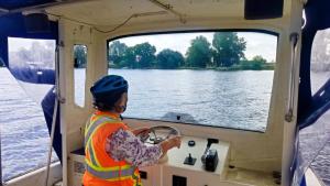 Jackie piloting ferry across Elbe River 