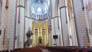 Mike thoroughly enjoying the very different St. Mary's Church, Stargard, Poland