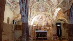 12th century Slovenian fortified church with frescoes everywhere