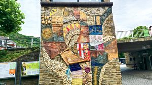 Interesting mosaic history wall in Cochem, Germany on the Mosel