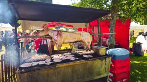 Mike intrigued with Pig Roast at Medieval Festival