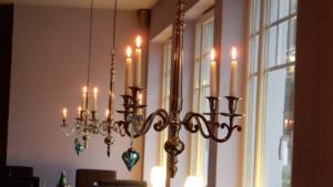 Real candles in Chandeliers throughout restaurant      