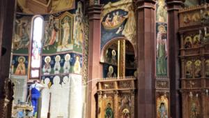 Artist working in new Orthodox church, Hunedoara, Romania    